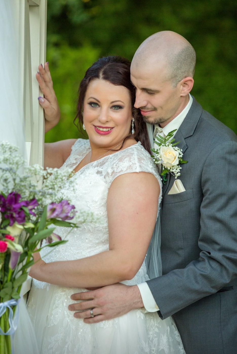 Bride and groom embracing
